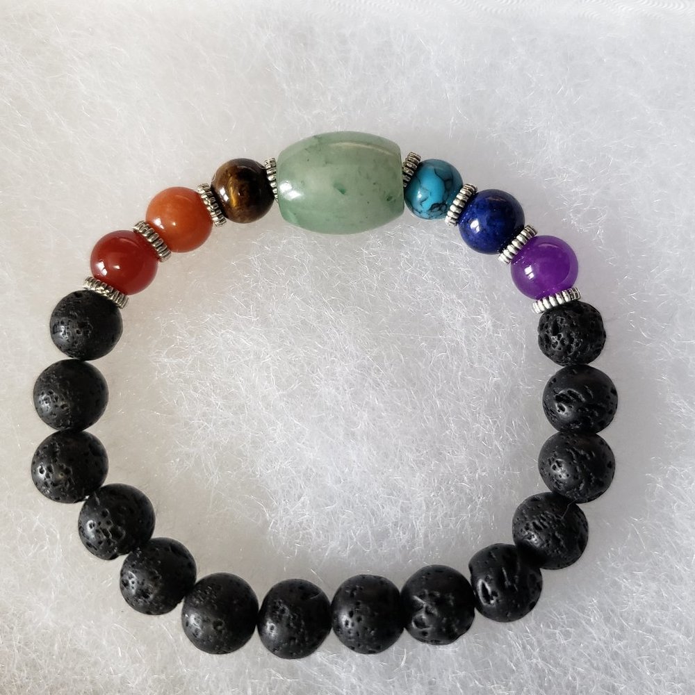 2/15$ NWOT lava beads and gemstone stretch bracelet